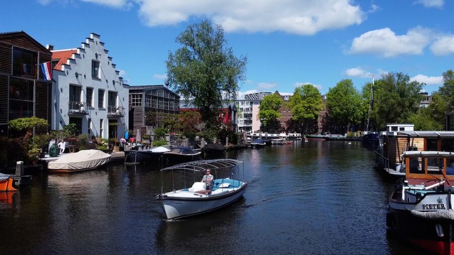 Amsterdam: Private Canal Tour - Entering Amsterdam by water, with a small-boat advantage