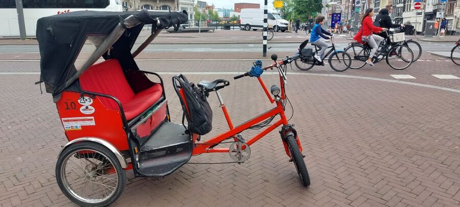Amsterdam: Private City Highlights Tour by Rickshaw - Magere Brug (Skinny Bridge) and the Amstel: the photo moment with meaning
