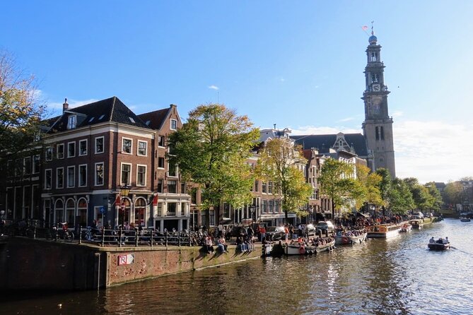 Amsterdam private city walking experience with a local - Nieuwmarkt: the Waag, guild power, and the dancing houses