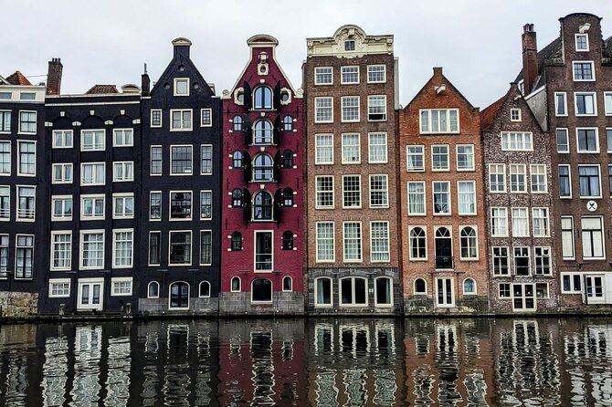 Amsterdam private city walking experience with a local - Dam Square and the Royal Palace: formation, monarchy, and WWII echoes