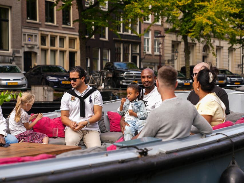 Amsterdam: Private Luxury Cruise with BBQ and Drinks - Covered and heated in colder days: plan as if it is still cold