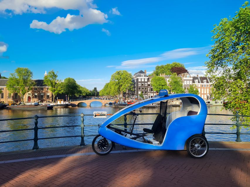Amsterdam: Private Pedicab Historical Sightseeing Tour - Nieuwmarkt and the 15th century city gate you can’t miss