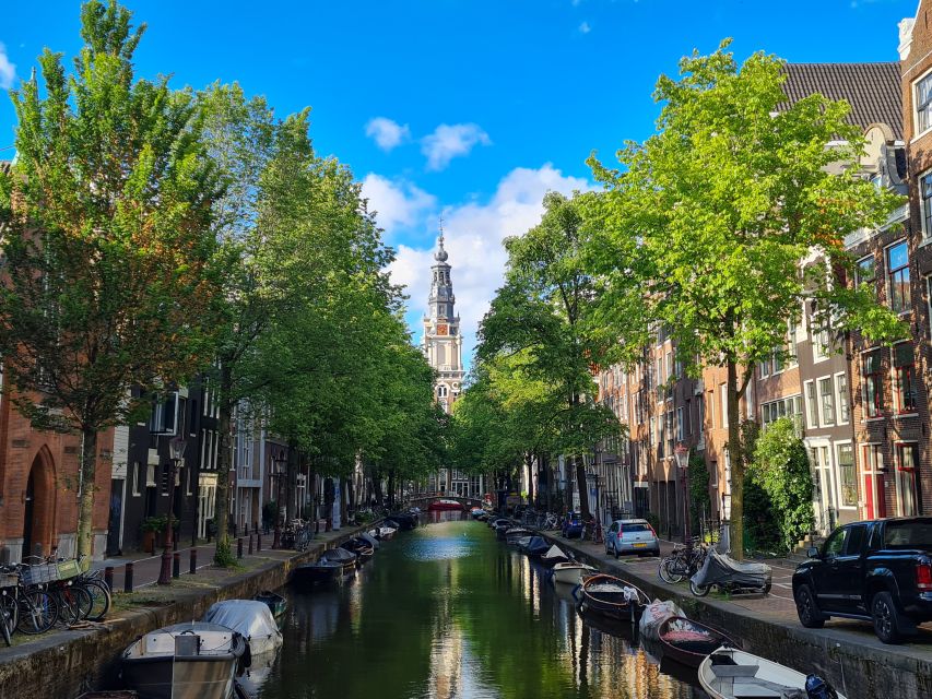 Amsterdam: Private Pedicab Historical Sightseeing Tour - The 17th-century canal district: half circles, merchant homes, and building patterns