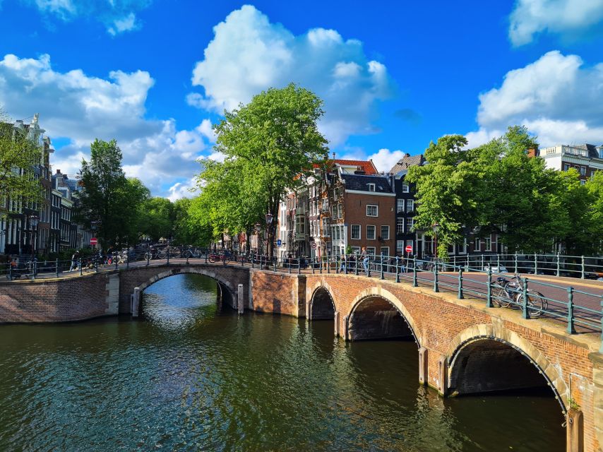 Amsterdam: Private Pedicab Historical Sightseeing Tour - Dam Square to Zeedijk: starting where Amsterdam became Amsterdam