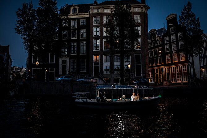 Amsterdam: Private Romantic Evening Canal Cruise + Bubbles/Snacks - Stories of love and romance tied to real landmarks
