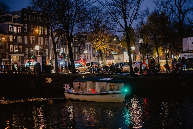 Amsterdam: Private Romantic Evening Canal Cruise + Bubbles/Snacks - The boat experience: silent, cozy, and built for close-up moments