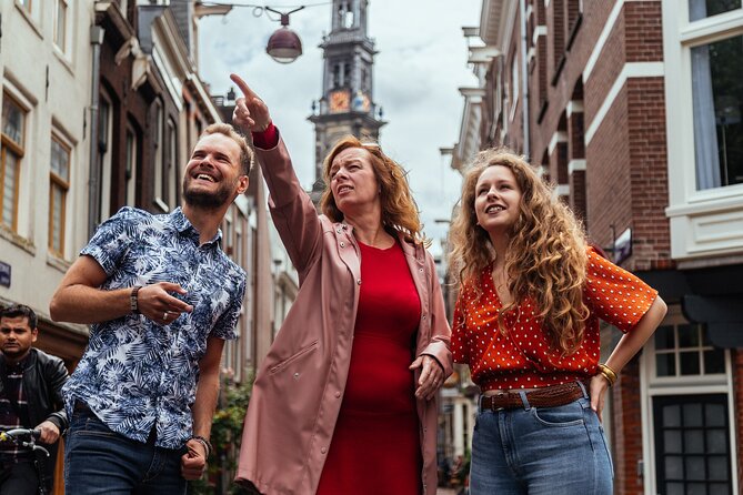 Amsterdam Private Tour: Highlights & Hidden Gems by Bike or Foot - Begijnhof’s hidden chapel courtyard, then a Flower Market contrast