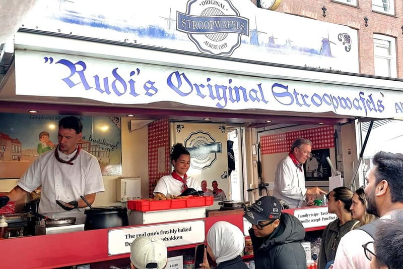 Amsterdam: Private Tour with Local Guide (French or English) - De Negen Straatjes and Dam Square: shopping streets meet central Amsterdam energy