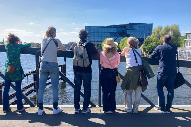 Amsterdam Private Walking Tour with Dinner Experience - Starting at Stationsplein, where Amsterdam moves like a clock