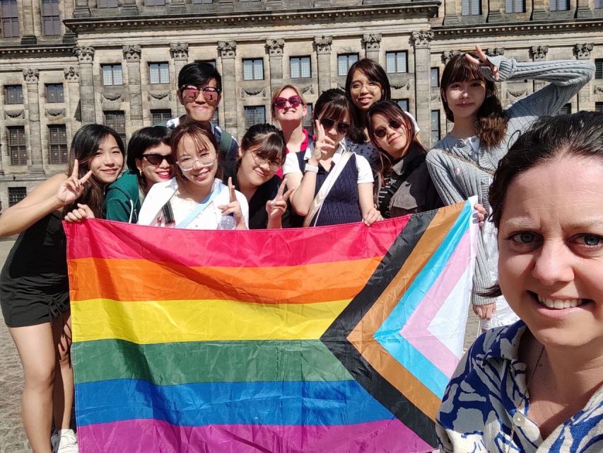 Amsterdam: Queer City Walking Tour With Local Guide - Eagle Amsterdam and the small moments you should actually notice