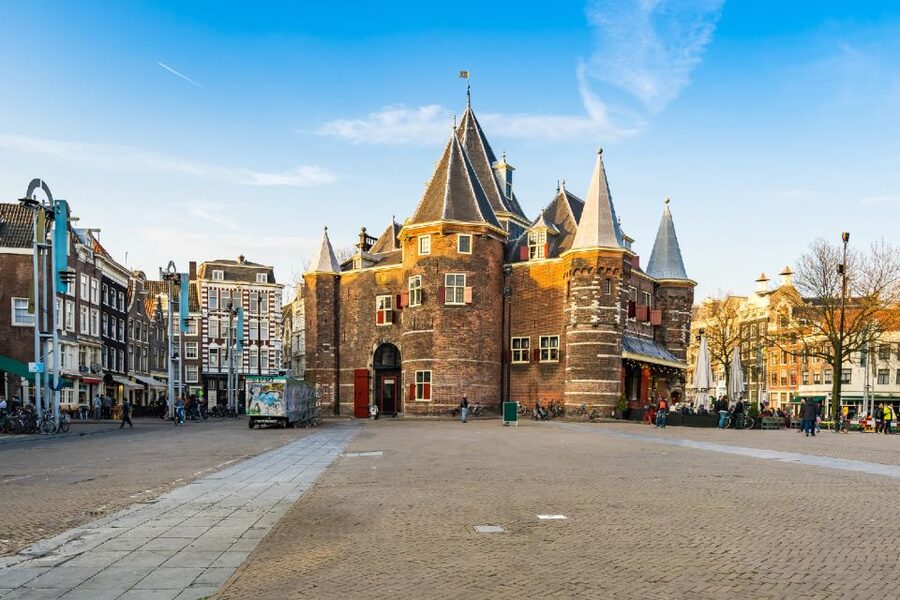 Amsterdam: Red Light District 1-hour Smartphone Audio Tour - How the Dam Square to Nieuwmarkt walk really works