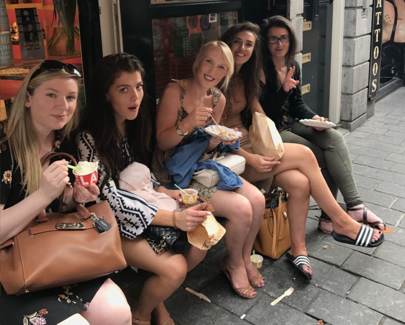 Amsterdam: Red Light District and Local Pub Tour - Royal Palace and Condomerie on the way to Dam Square