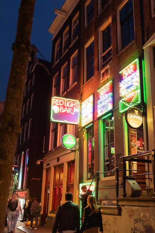 Amsterdam: Red Light Tour Exclusive + Peep Show - Dam Square Start: How the Tour Sets Tone Before You Enter