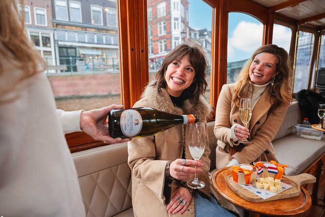 Amsterdam: Romantic Canal Cruise with Optional Bubbles & Bites - Meeting at Anne Frank House: Jordaan canal views from minute one