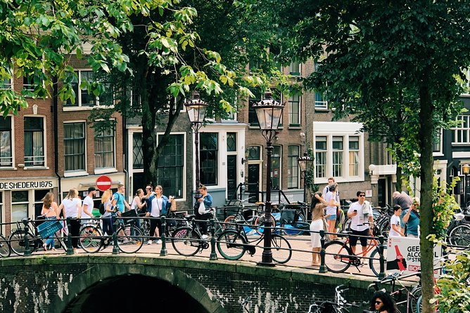 Amsterdam's Unexpected Treasures Private Walking Tour - Stop by stop: Centraal Station, canals, Chinatown, and Begijnhof