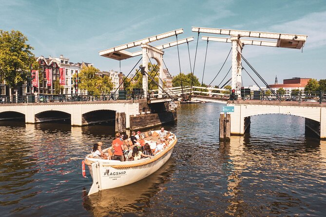 Amsterdam: Saloon Boat Cruise + Unlimited Drinks & Bite option - Stop-by-Stop: Zuiderkerk, Opera House, and the Drunken Houses