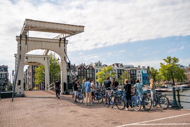 Amsterdam Small-Group Bike Tour With Optional Canal Cruise - Amsterdam Centraal to De Gooyer Windmill: the grand intro stops