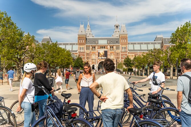 Amsterdam Small-Group Bike Tour With Optional Canal Cruise - ARTIS context and the narrow bridge moment you will remember