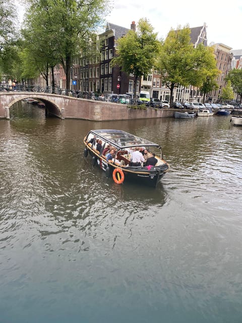 Amsterdam Small Group Canal Cruise inc Snacks/Drinks Winter - Boats AMS1 and Jochie: small-group comfort on the water