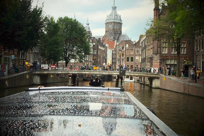 Amsterdam Small-Group Canal Cruise Including Snacks and Drinks - Captain stories: how the narration changes your view of Amsterdam