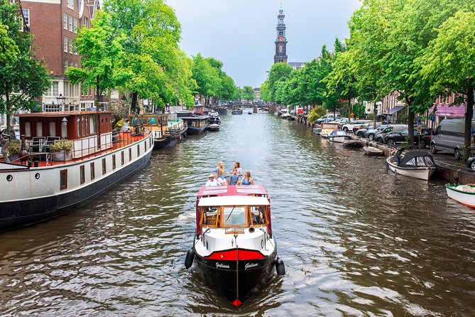 Amsterdam Small-Group Canal Cruise With Dutch Snacks and Drink - Bridges, long canal stretches, and the “old Amsterdam” feeling
