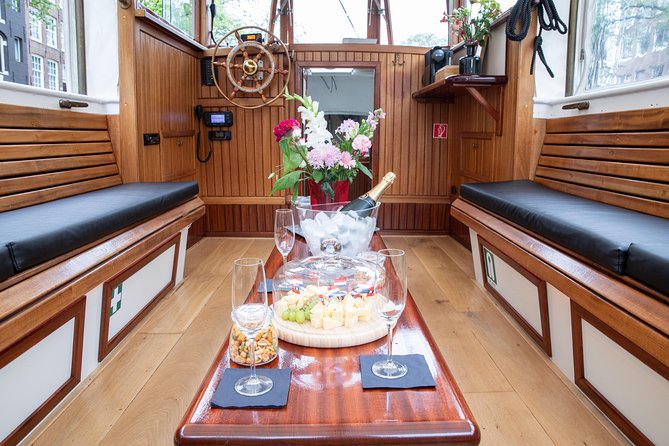 Amsterdam Small-Group Canal Cruise With Dutch Snacks and Drink - LGBT+ monument and the city’s modern layers