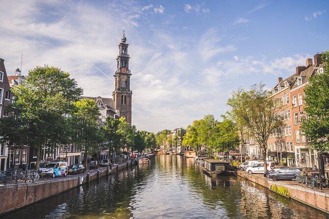 Amsterdam Small-Group Walking Tour with Typical Dutch Pancake - Dam Square: the heart of Amsterdam, close to the classic must-sees