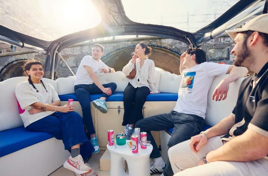 Amsterdam: Smoke & Cruise on covered Cannabis Boat With Bar - The 1-hour route, stop by stop (Red Light, Centraal, and the big canals)