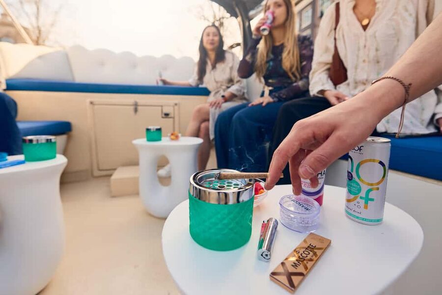 Amsterdam: Smoke & Cruise on covered Cannabis Boat With Bar - Onboard bar, blankets, and what weather really means here