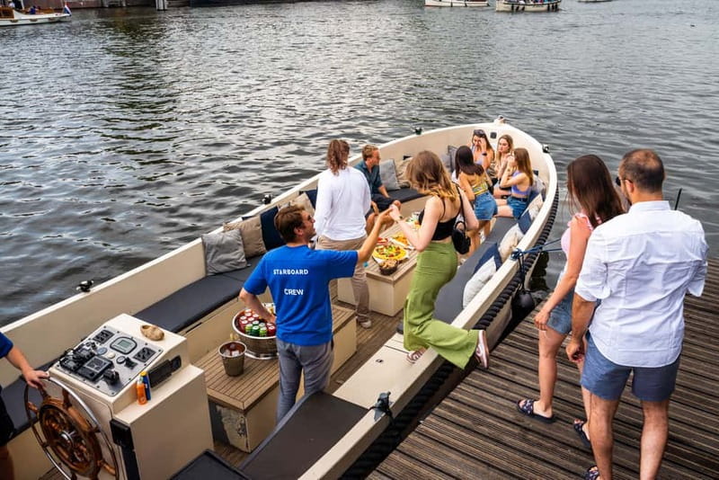 Amsterdam: Spanish Guided Open Boat Cruise with Bar Onboard - Bar Onboard and Weather Reality: Open Boats March-Oct, Closed in Winter