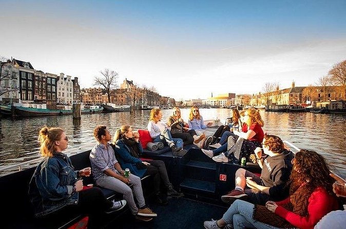 Amsterdam Sunset Canal Cruise with Live Guide and Open Bar - Hermitage area to the Amstel: the first stretch of views
