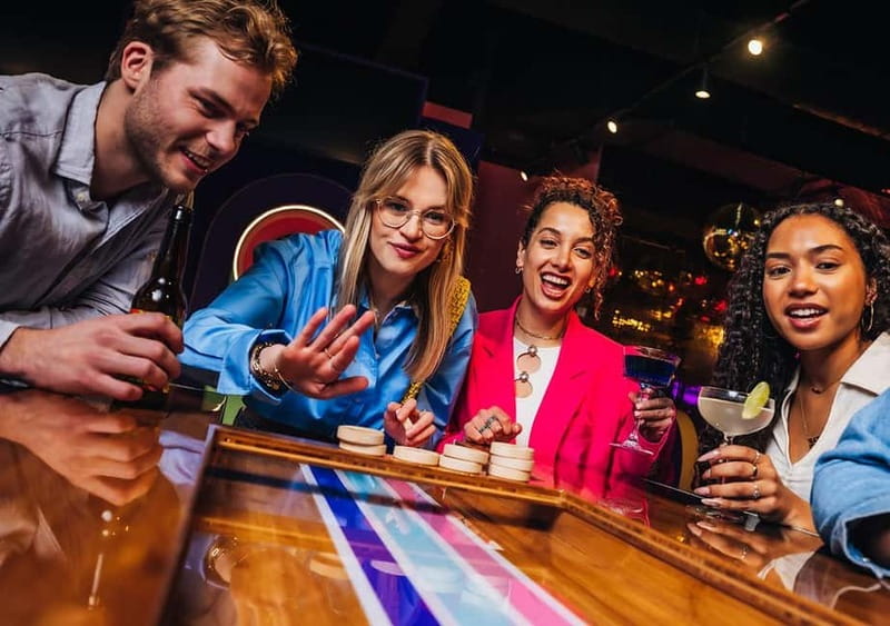 Amsterdam: The All Out - No.1 Activity Bar - Pick your game: darts, karaoke, or shuffleboard in one planned hour