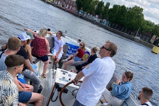 Amsterdam: The Bulldog Boat Smoke-Friendly Cruise & 2 Drinks - Finding the boat at Amsterdam Central Station (steps, trams, and the blue beach flag)
