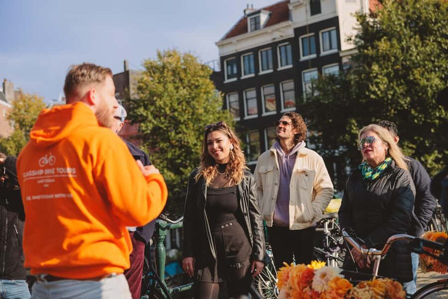 Amsterdam: Top Highlights Guided Bike Tour - Rijksmuseum photo stop and Grachtengordel UNESCO canal views