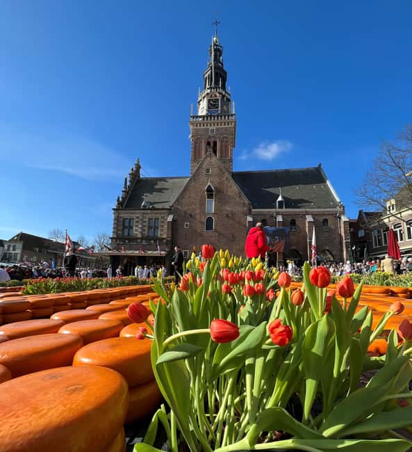 Amsterdam: Traditional Cheese Market Tour to Alkmaar - The Cheese Trading Show: Handclaps, Cheese Girls, and Demonstrations