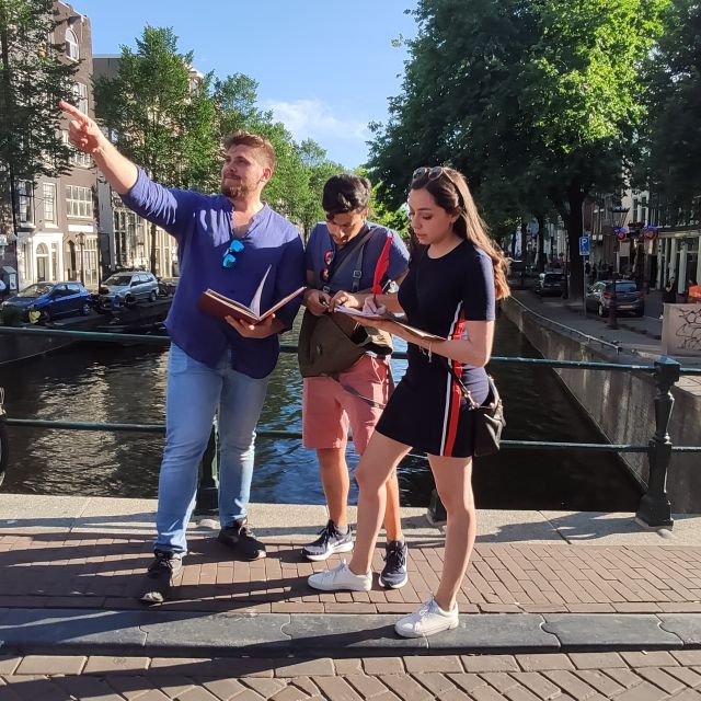 Amsterdam: Treasure Hunt Walking Tour "A Secret Sender" - Walking through the Red Light District segment