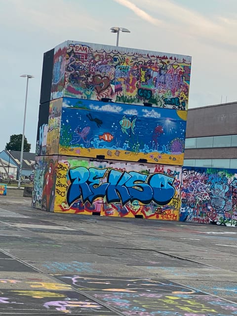 Amsterdam: Urban Bike Tour, Graffiti Art & Magnet Fishing - IJ Ferry Time: A Quick Change of Perspective
