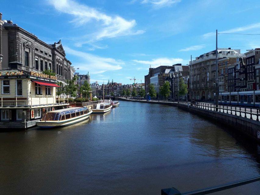 Amsterdam Walking Tour and Canal Cruise - Dam Square and the West Church area, with meaning not just names