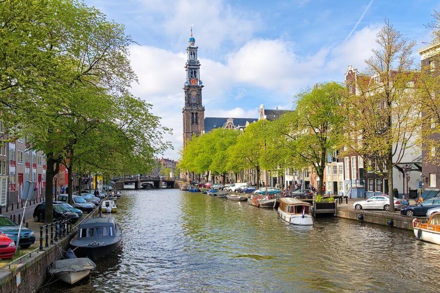 Amsterdam Walking Tour and Canal Cruise - Meeting point, pickup, and where the tour starts near Central Station