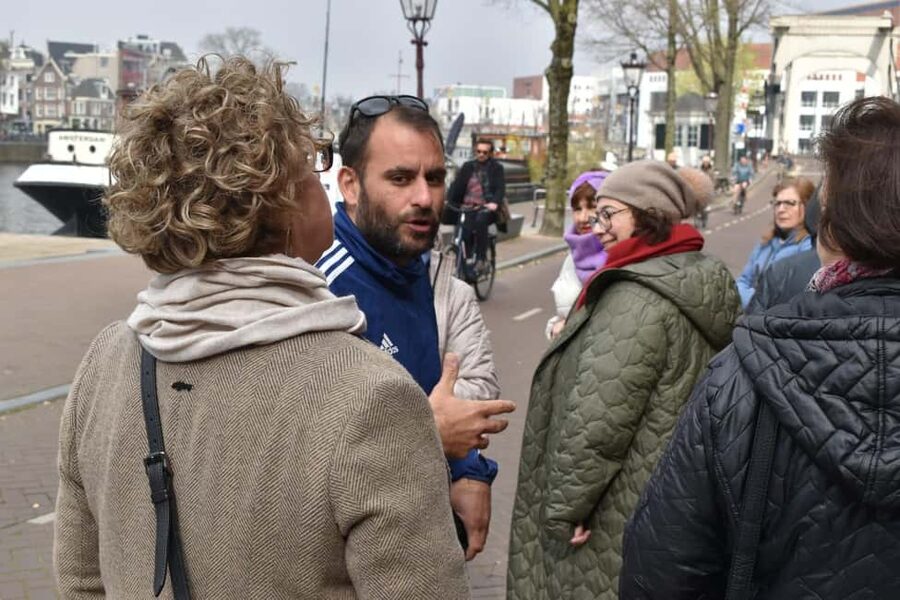 Amsterdam Walking Tour:Anne Frank, History & Liberal Culture - The leaning houses, the canal rhythm, and the idea of living with water
