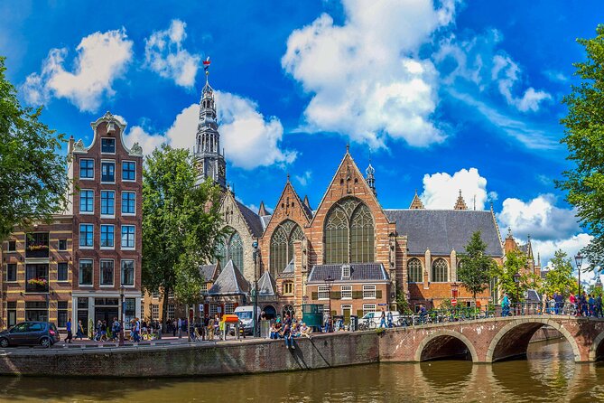 Amsterdam Walking Tour with Audioguide on Your Smartphone - Beguinage to Singel to Bloemenmarkt: Quiet Courtyards and Floating Flowers
