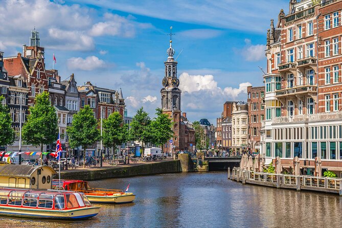 Amsterdam Walking Tour with Audioguide on Your Smartphone - Munttoren to Paradiso: Film Palaces, City Archives, and Beer