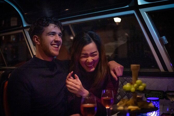 Amsterdam Wine and Cheese Guided Evening Cruise - Live commentary and music: how to get the most info