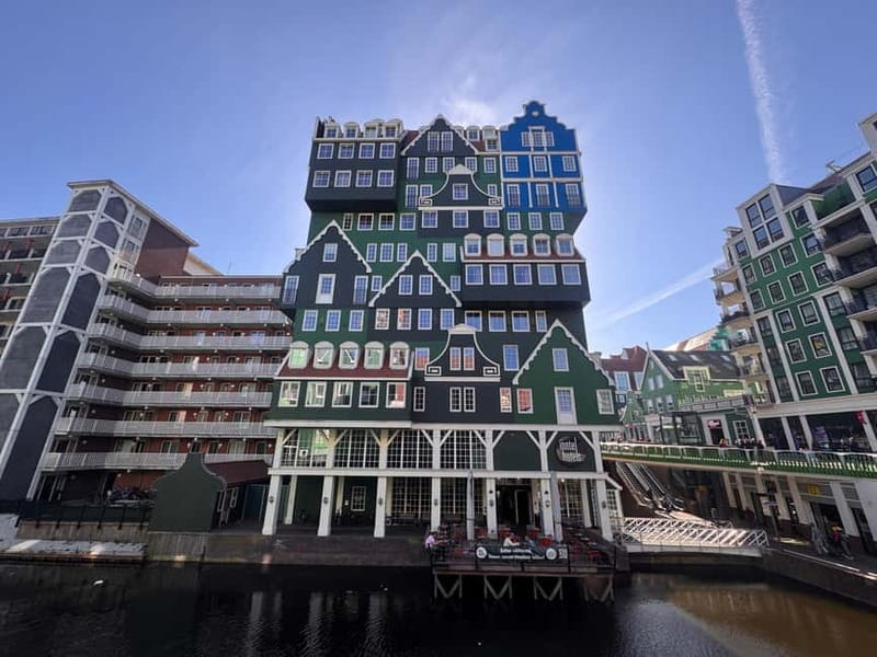 Amsterdam: Zaanse Schans Windmills & Zaandam E-Bike Tour - The ride back through Amsterdam and NDSM Werf: from old harbor to creative industry