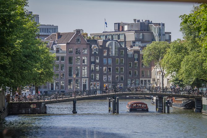 Anne Frank Private Bike Tour in Amsterdam - Spinoza Monument stop: a pause with a thinker’s thread