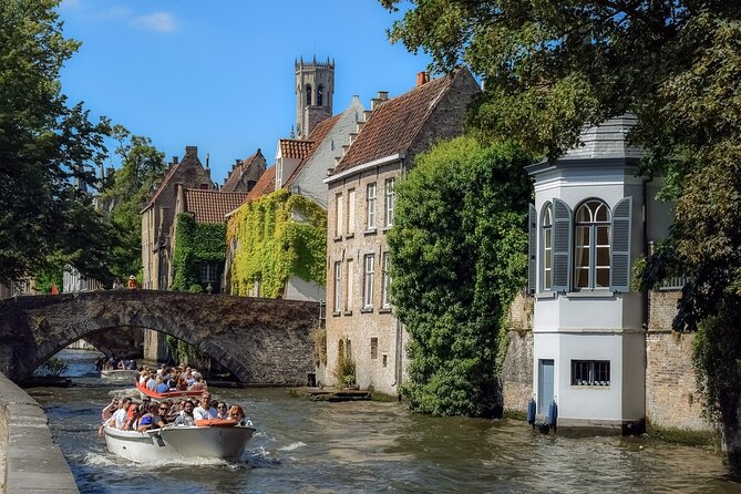 Charms of Brussels and Bruges Day Trip from Amsterdam - Brussels Morning Highlights: Atomium, UNESCO Square, Tintin Murals, and Mont des Arts
