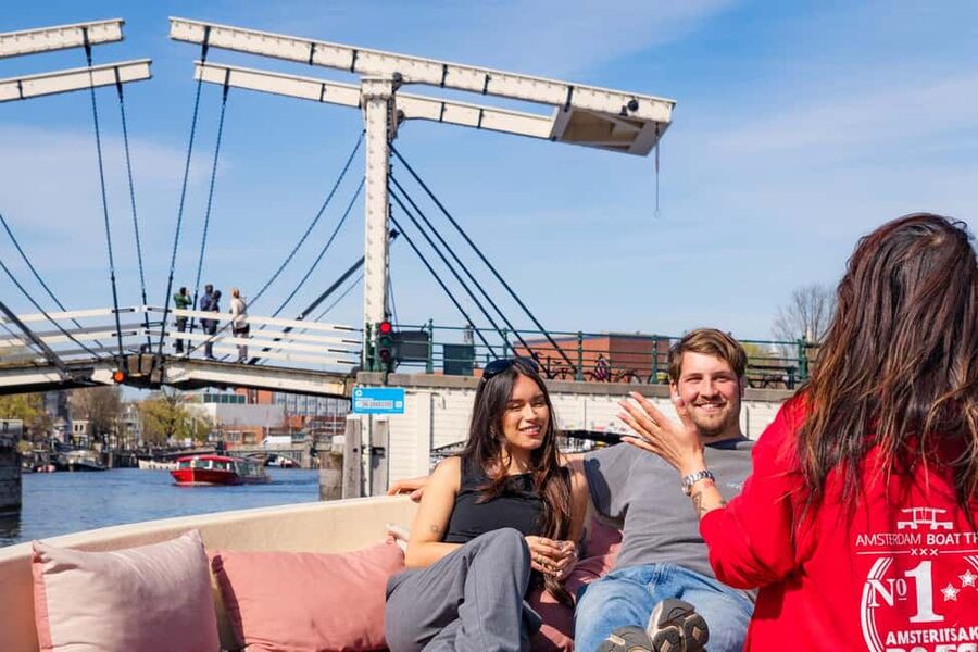 Cheese & Drinks Guided Amsterdam Boat Tour, All Inclusive - Your Guide Matters: Stories, Humor, and Local Names You Might Hear