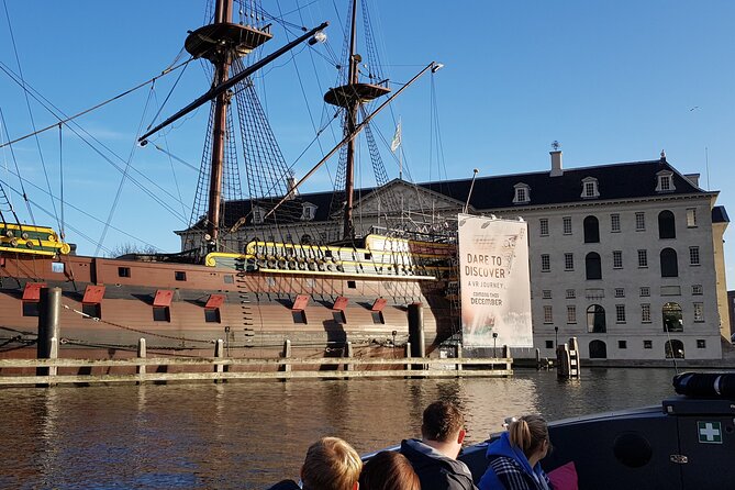Classic Salonboat Tour in Amsterdam Including Cheese and Wine - Jordaan, Prinsengracht, and the Amstel: canals with names and reasons