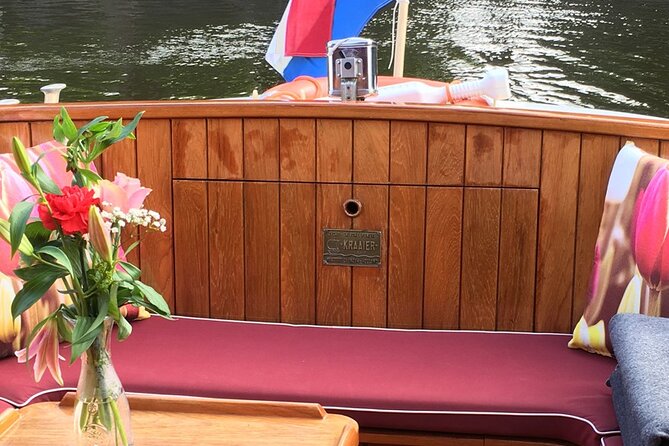 Cruise Amsterdam like a Local — Small Group 12 pax - Boat comfort on a cold Amsterdam canal night