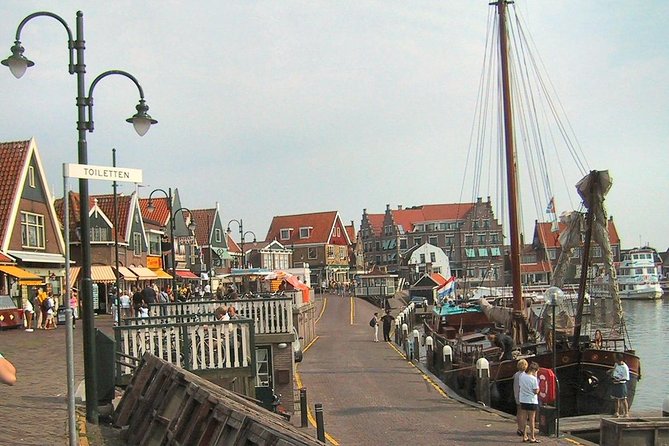 Day Trip from Amsterdam to Zaanse Schans Windmills and Volendam - Alida Hoeve cheese farm and wooden shoe factory: where the day gets hands-on